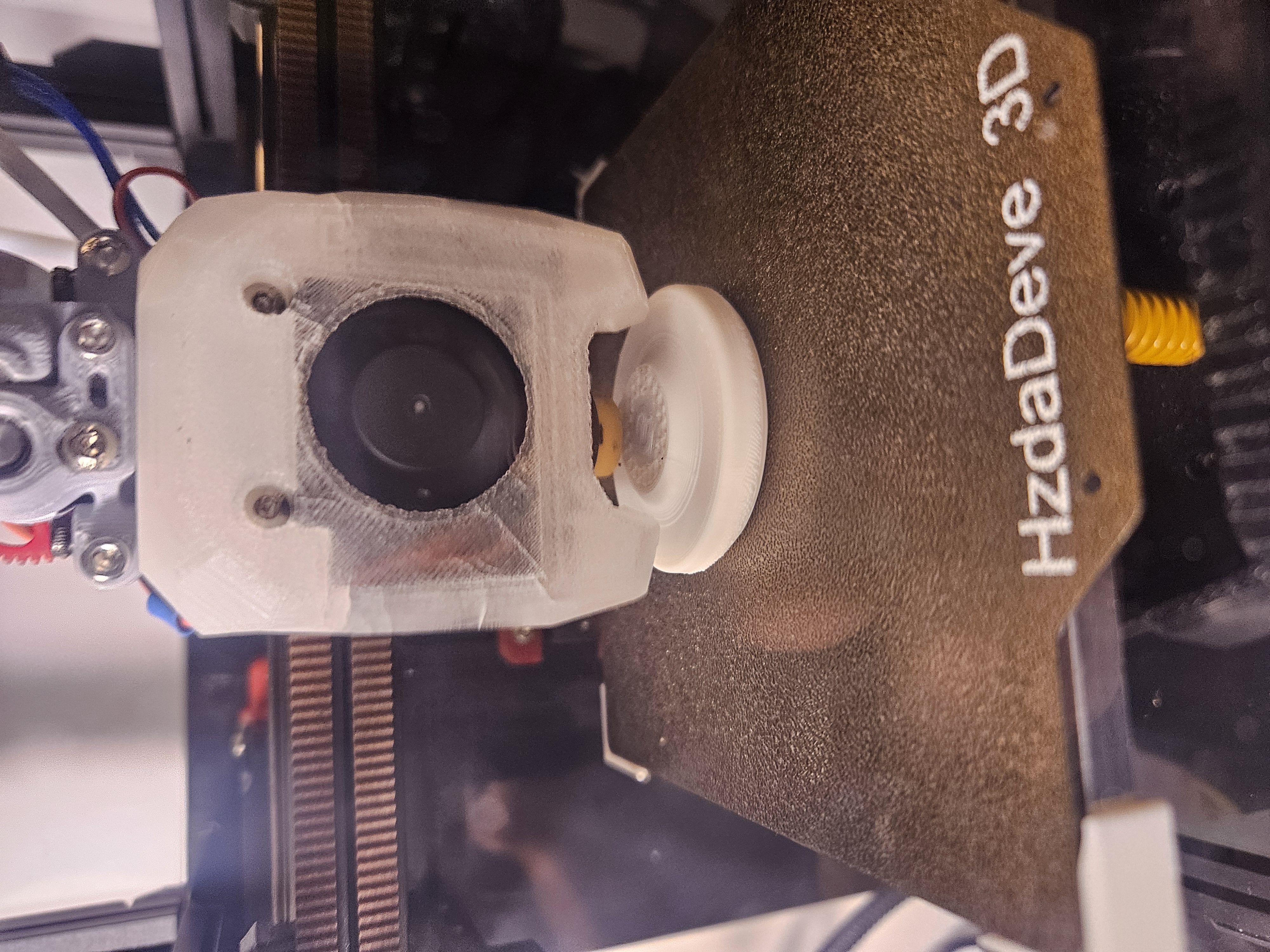 Printing sacrificial layer over nut