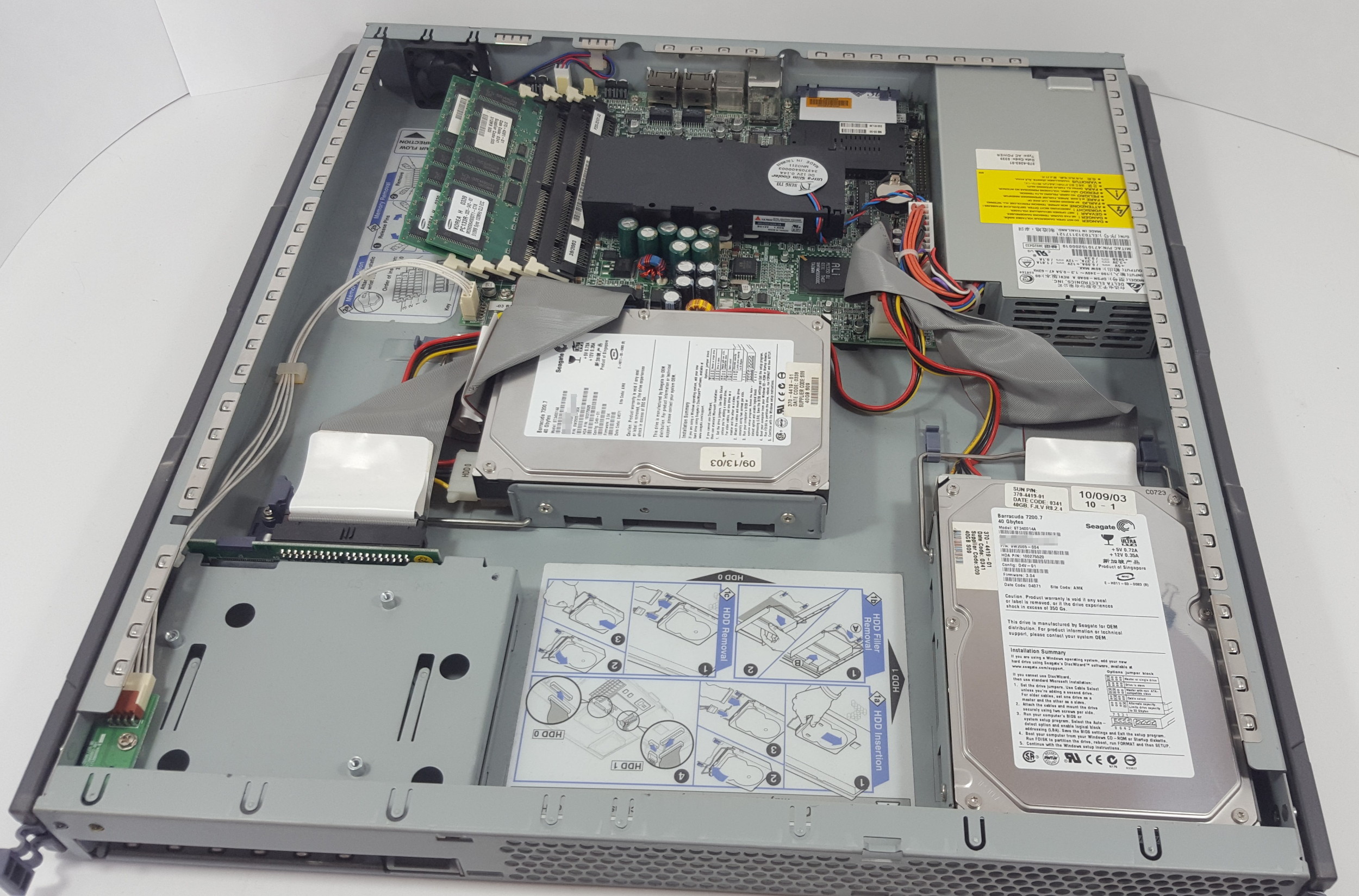 Sun Fire V100 opened showing mainboard and layout in original case